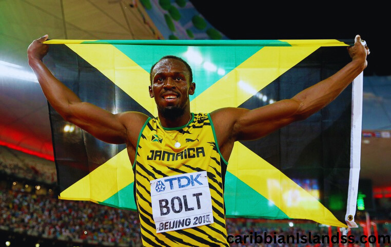 Usain Bolt with Jamaican flag in Caribbean Islands